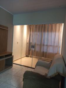 Ένα ή περισσότερα κρεβάτια σε δωμάτιο στο apartamento confortável +16 φωτογραφίες