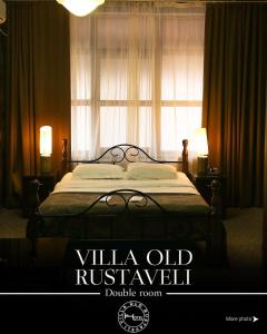 Postel nebo postele na pokoji v ubytování Hotel Old Rustaveli