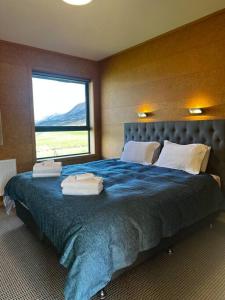 Ένα ή περισσότερα κρεβάτια σε δωμάτιο στο Lake Ohau Quarters