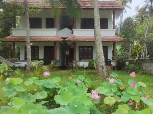 Garður fyrir utan paddy farm beach resort odayam varkala