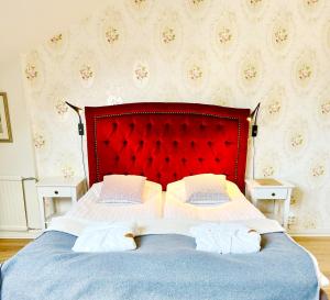 Postel nebo postele na pokoji v ubytování Hotel Concordia