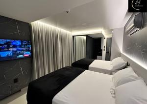 Ein Bett oder Betten in einem Zimmer der Unterkunft LM Get One