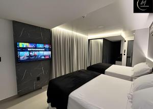 Ein Bett oder Betten in einem Zimmer der Unterkunft LM Get One