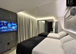 Ein Bett oder Betten in einem Zimmer der Unterkunft LM Get One