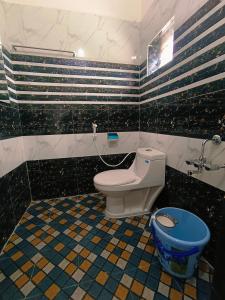 Koupelna v ubytování Hampi Anjana home stay + 9 fotografií