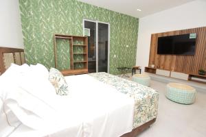 Postel nebo postele na pokoji v ubytování Hotel Boutique Palma Arena