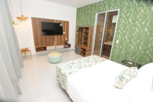 Postel nebo postele na pokoji v ubytování Hotel Boutique Palma Arena