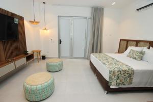 Postel nebo postele na pokoji v ubytování Hotel Boutique Palma Arena