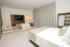 Postel nebo postele na pokoji v ubytování Hotel Boutique Palma Arena