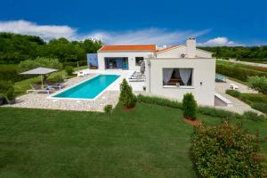 an image of a villa with a swimming pool at Villa Una Sofia in Pazin