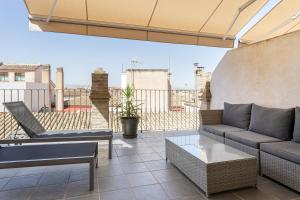 Ein Balkon oder eine Terrasse in der Unterkunft Room Mate Leo, Granada