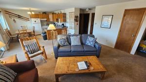 a living room with a couch and a coffee table at 205-F Buffalo Ridge in Silverthorne