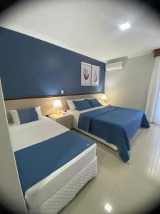 Postel nebo postele na pokoji v ubytování Hotel Taiyo