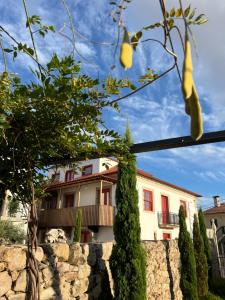 a house in front of a stone wall at Casa Dr Ramiro Salgado - Douro Superior, Torre de Moncorvo in Torre de Moncorvo +34 photos