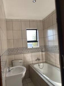 Vannituba majutusasutuses Normans in St Georges strand beach