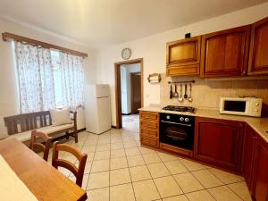 Kuchyň nebo kuchyňský kout v ubytování Apartma Suzy