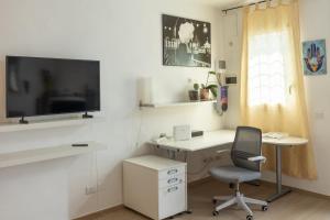 TV a/nebo společenská místnost v ubytování Casa di Simone