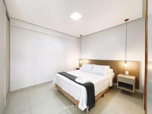 Ένα ή περισσότερα κρεβάτια σε δωμάτιο στο Onix Bueno Residence - ONX
