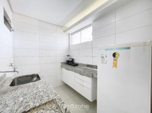 Η κουζίνα ή μικρή κουζίνα στο Onix Bueno Residence - ONX