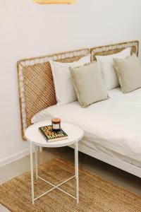 Ένα ή περισσότερα κρεβάτια σε δωμάτιο στο M Apartments