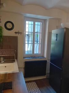 Ένα μπάνιο στο Appartement charmant à Alès | 62 m² | Piscine privée