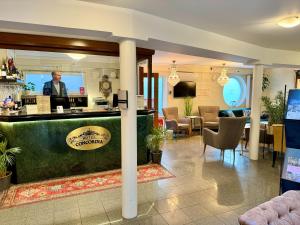 TV a/nebo společenská místnost v ubytování Hotel Concordia