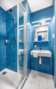 Kamar mandi di Hotel Active Stadium