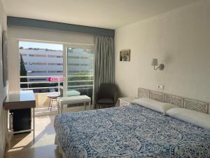 Postel nebo postele na pokoji v ubytování Hostal Roberto