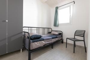 Postel nebo postele na pokoji v ubytování La Rondine