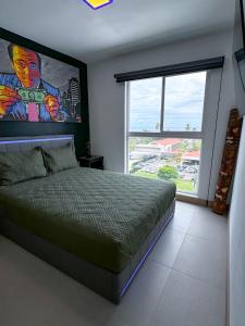 Postel nebo postele na pokoji v ubytování Luxury Condo at Viva Jaco Residence
