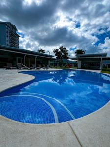 Bazén v ubytování Luxury Condo at Viva Jaco Residence nebo v jeho okolí