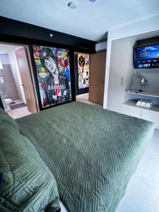 TV a/nebo společenská místnost v ubytování Luxury Condo at Viva Jaco Residence
