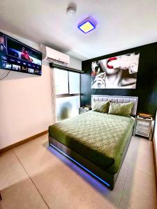 Postel nebo postele na pokoji v ubytování Luxury Condo at Viva Jaco Residence
