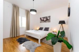 Posteľ alebo postele v izbe v ubytovaní Villa La Pieda