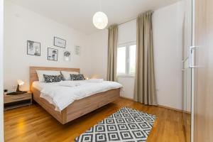Posteľ alebo postele v izbe v ubytovaní Villa La Pieda