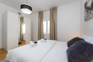 Posteľ alebo postele v izbe v ubytovaní Villa La Pieda