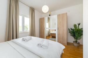 Posteľ alebo postele v izbe v ubytovaní Villa La Pieda