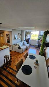 Posezení v ubytování Apartamento completo no Rio com Vista