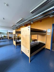 Postel nebo postele na pokoji v ubytování Bergen Hostel Montana