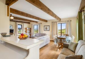 Posezení v ubytování Glynsk Pier Cottage