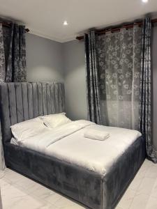 Postel nebo postele na pokoji v ubytování La vue suites