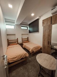 Uma cama ou camas num quarto em Best Builder