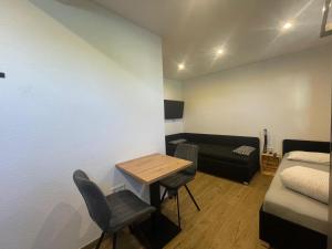 Posezení v ubytování Apartments Metzingen Panoramablick
