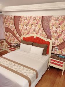 Postel nebo postele na pokoji v ubytování Mucha Motel