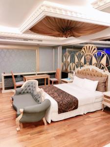 Postel nebo postele na pokoji v ubytování Mucha Motel
