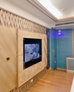TV a/nebo společenská místnost v ubytování Mucha Motel + 19 fotografií