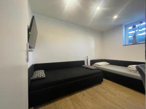 Postel nebo postele na pokoji v ubytování Apartments Metzingen Panoramablick