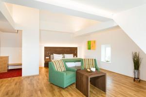 Posteľ alebo postele v izbe v ubytovaní Joglland Hotel Prettenhofer
