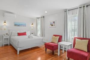 Postel nebo postele na pokoji v ubytování Eagle Wing Inn - Cape Cod + 37 fotografií