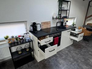 Kuchyň nebo kuchyňský kout v ubytování GLEIS 13 - THE LOFT im ehemaligen Lokschuppen